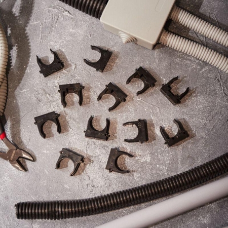 Держатель для труб (клипса) d25мм для монтажного пистолета черн. Rexant 28-0425-2